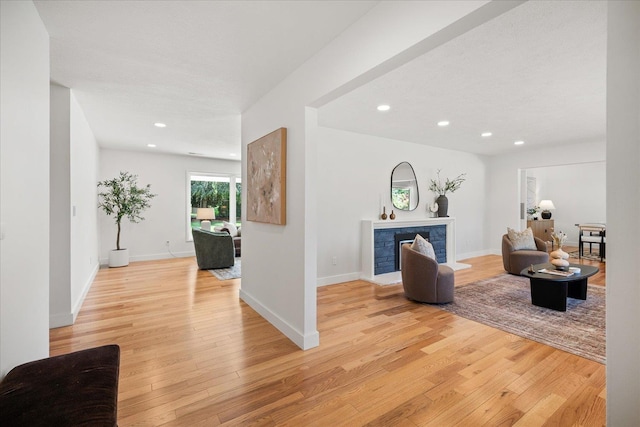 915 W 32nd Ave, Spokane, WA 99203 - living room with light wood-style floors, recessed lighting, and a fireplace