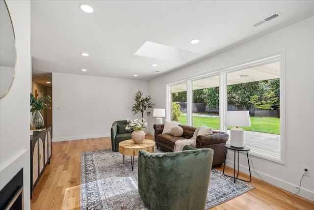915 W 32nd Ave, Spokane, WA 99203 - living room with a skylight, light wood-style floors, and recessed lighting