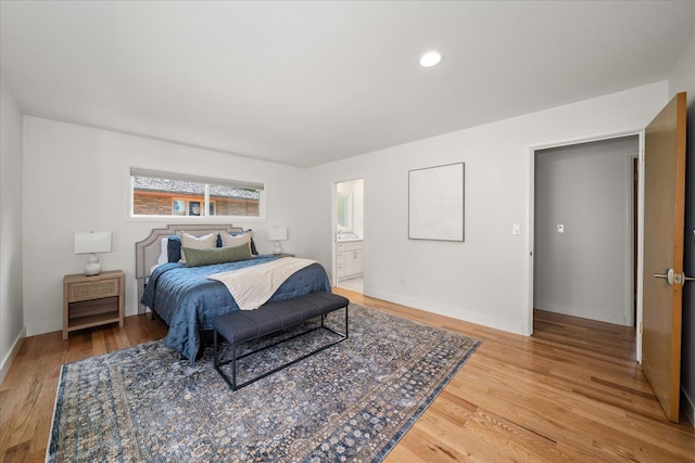 915 W 32nd Ave, Spokane, WA 99203 - bedroom with light wood finished floors, ensuite bathroom, and recessed lighting