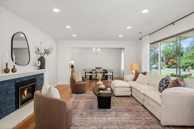 915 W 32nd Ave, Spokane, WA 99203 - living room featuring wood finished floors, recessed lighting, and a tile fireplace