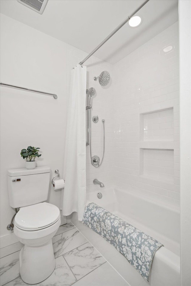 915 W 32nd Ave, Spokane, WA 99203 - full bathroom featuring shower / tub combo with curtain and marble finish floors