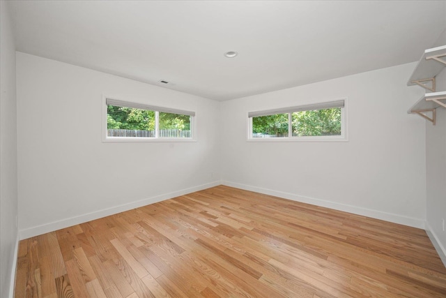 915 W 32nd Ave, Spokane, WA 99203 - spare room with healthy amount of natural light and light wood-style floors