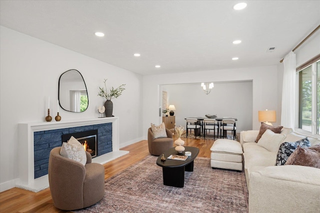 915 W 32nd Ave, Spokane, WA 99203 - living area with wood finished floors, recessed lighting, and a tile fireplace