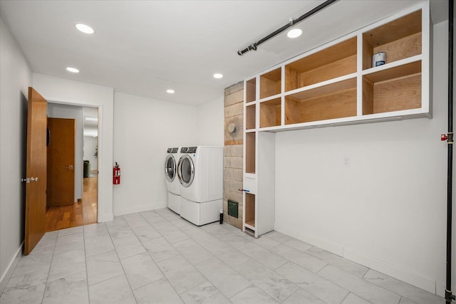 915 W 32nd Ave, Spokane, WA 99203 - washroom with independent washer and dryer, light marble finish flooring, and recessed lighting