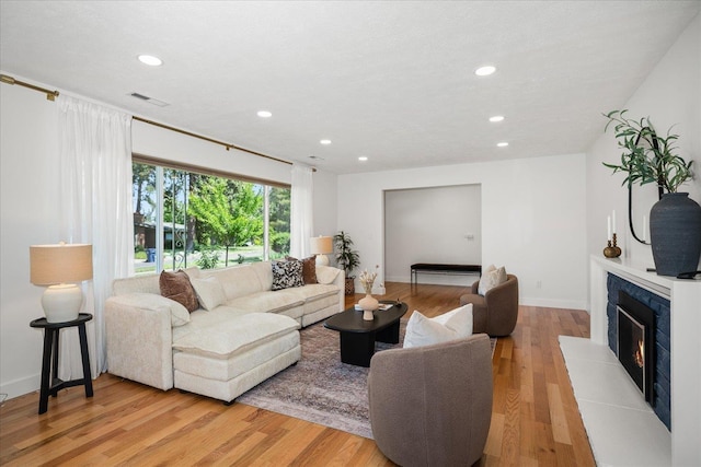 915 W 32nd Ave, Spokane, WA 99203 - living area with light wood finished floors, recessed lighting, and a fireplace
