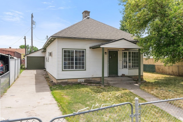 405 W 5th St, Sprague, WA 99204 - view of front of home with roof with shingles and a chimney