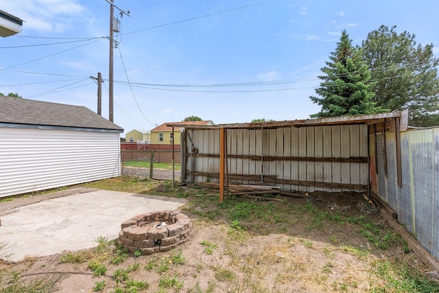 405 W 5th St, Sprague, WA 99204 - view of yard featuring a fire pit and a patio area