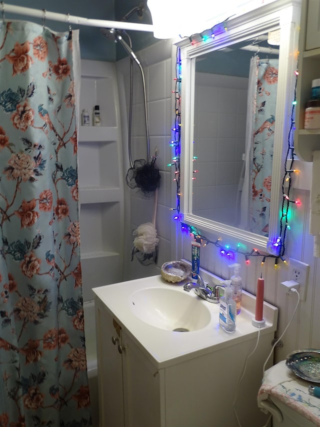 210 W Bartlett St, Oakesdale, WA 99158 - bathroom featuring vanity and tasteful backsplash