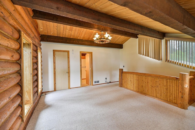 42325 N Sylvan Rd, Elk, WA 99009 - unfurnished room with a wood ceiling with exposed beams, carpet, and a chandelier