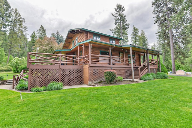 42325 N Sylvan Rd, Elk, WA 99009 - rear view of house featuring a lawn and a deck