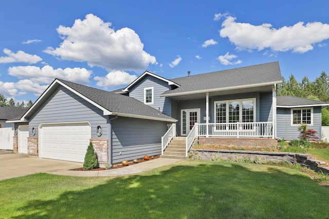 15618 N Chronicle Ct, Mead, WA 99021 - tri-level home with a garage, a porch, a front yard, driveway, and a shingled roof