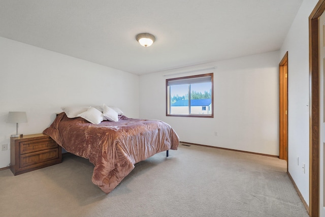 15618 N Chronicle Ct, Mead, WA 99021 - bedroom featuring light carpet and baseboards