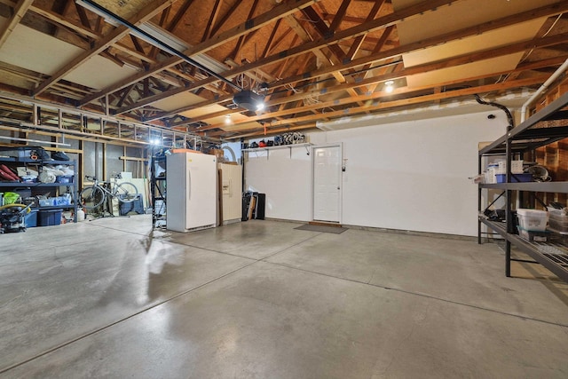 15618 N Chronicle Ct, Mead, WA 99021 - garage featuring freestanding refrigerator