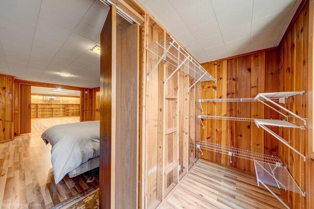 1003 W Eastmont Way, Spokane, WA 99208 - walk in closet featuring wood finished floors