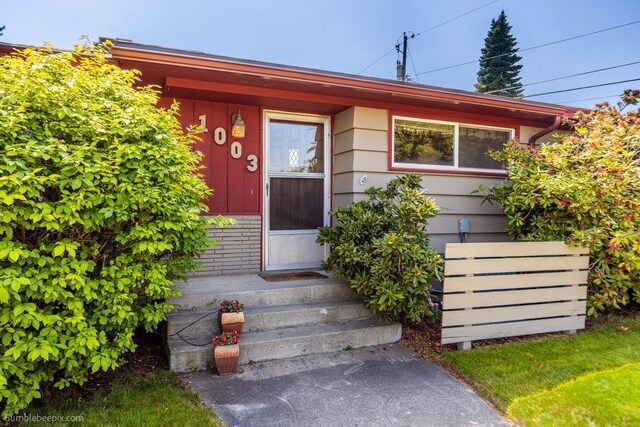 1003 W Eastmont Way, Spokane, WA 99208 - view of exterior entry featuring brick siding