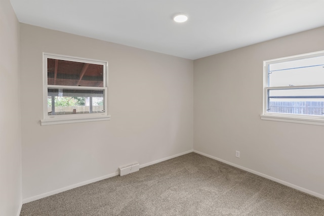 5804 N Maple St, Spokane, WA 99205 - spare room with carpet floors and healthy amount of natural light