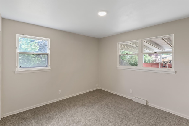 5804 N Maple St, Spokane, WA 99205 - spare room with healthy amount of natural light and carpet