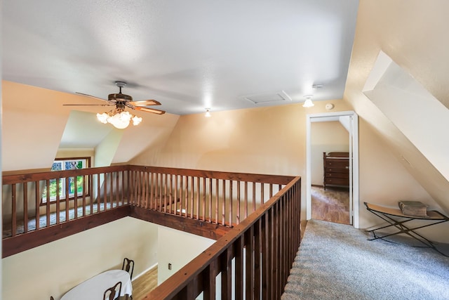882 Diamond Creek Rd, Newport, WA 99156 - hall featuring vaulted ceiling, carpet, and attic access