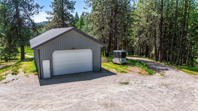 882 Diamond Creek Rd, Newport, WA 99156 - detached garage featuring a forest view
