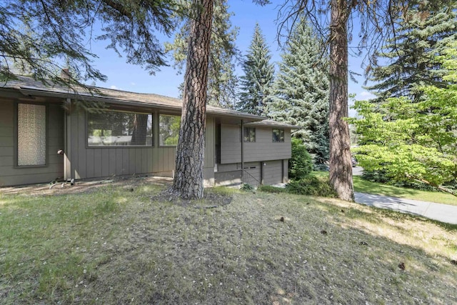 812 W Westover Rd, Spokane, WA 99218 - view of side of property with a garage