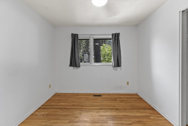 812 W Westover Rd, Spokane, WA 99218 - unfurnished room featuring light wood finished floors and baseboards