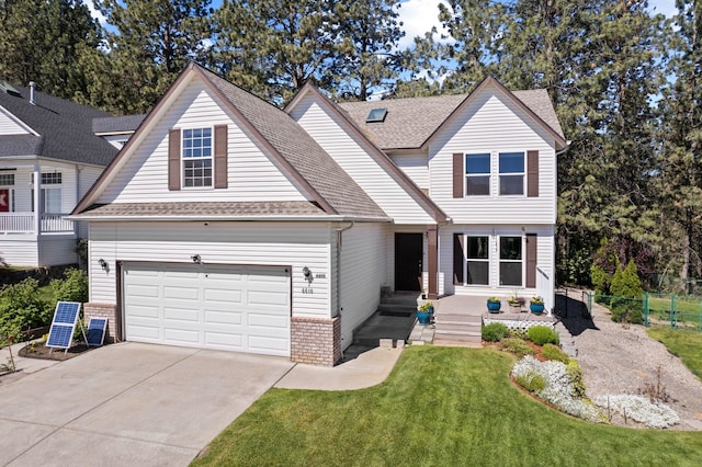 6610 S Echo Ridge St, Spokane, WA 99224 - traditional-style home with driveway, brick siding, a shingled roof, and an attached garage