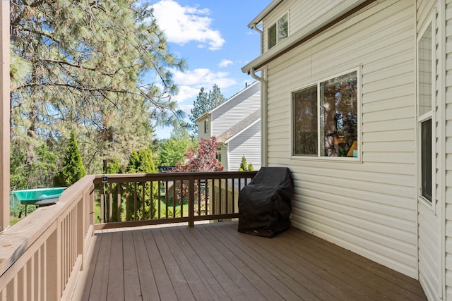 6610 S Echo Ridge St, Spokane, WA 99224 - wooden deck with a grill