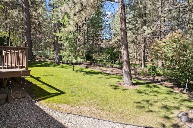 6610 S Echo Ridge St, Spokane, WA 99224 - view of grassy yard with a wooden deck