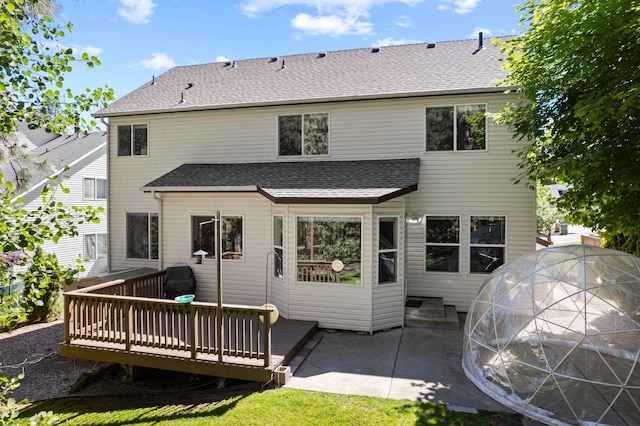 6610 S Echo Ridge St, Spokane, WA 99224 - rear view of house with roof with shingles, a deck, and a patio
