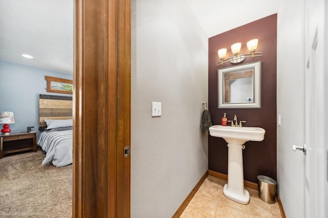 1629 S Royal St, Spokane, WA 99224 - bathroom featuring baseboards and connected bathroom