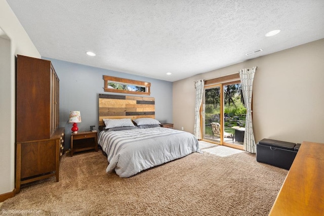 1629 S Royal St, Spokane, WA 99224 - bedroom with carpet, access to exterior, recessed lighting, and a textured ceiling