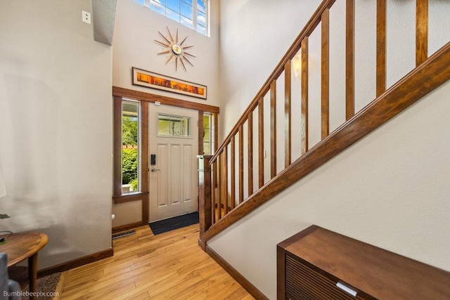 1629 S Royal St, Spokane, WA 99224 - entrance foyer featuring light wood-style flooring, stairway, and a high ceiling