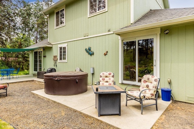 1629 S Royal St, Spokane, WA 99224 - view of patio with a hot tub and an outdoor fire pit