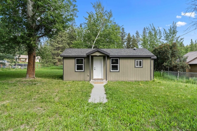610 N 1st St, Springdale, WA 99173 - view of front of house featuring an outdoor structure and roof with shingles