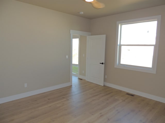 516 SW Alder St, Wilbur, WA 99185 - empty room featuring plenty of natural light and light wood-style floors