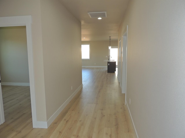 516 SW Alder St, Wilbur, WA 99185 - corridor with light wood-style floors and recessed lighting