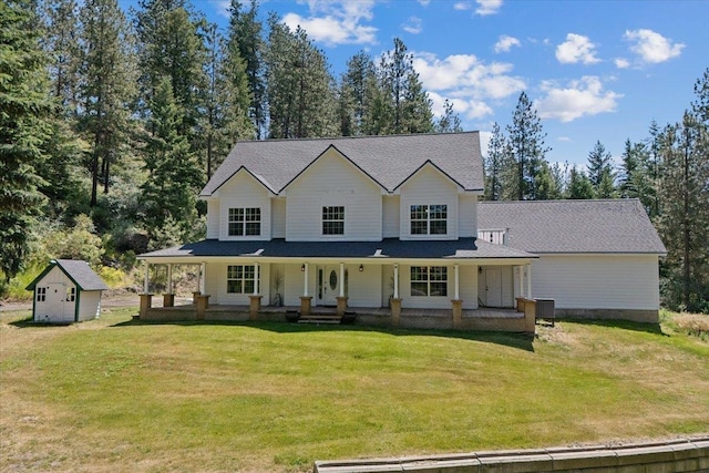 12710 E Kronquist Rd, Mead, WA 99021 - view of front of property with a storage unit, a front yard, and a porch