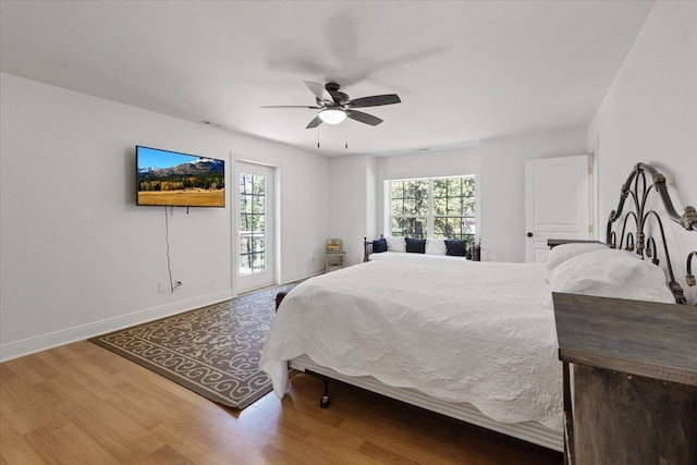 12710 E Kronquist Rd, Mead, WA 99021 - bedroom featuring wood finished floors and a ceiling fan