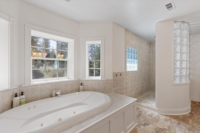 12710 E Kronquist Rd, Mead, WA 99021 - bathroom featuring a walk in shower and a tub with jets