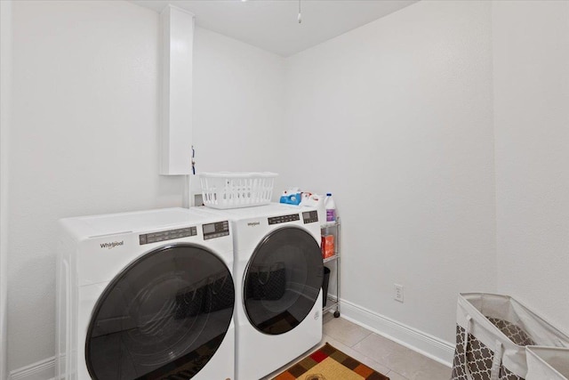 12710 E Kronquist Rd, Mead, WA 99021 - laundry area featuring separate washer and dryer and light tile patterned floors