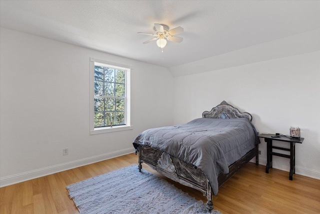 12710 E Kronquist Rd, Mead, WA 99021 - bedroom with light wood-style floors and ceiling fan