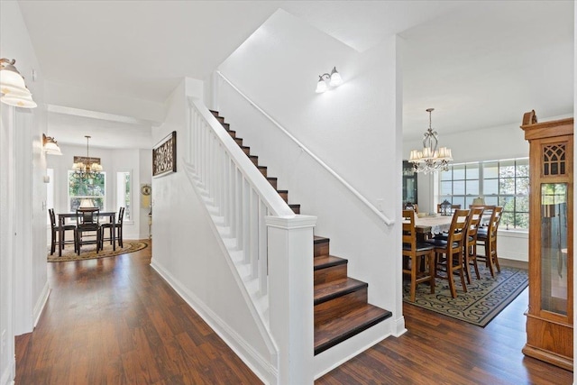 12710 E Kronquist Rd, Mead, WA 99021 - staircase featuring a chandelier and wood finished floors