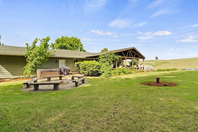 25210 E Bradshaw Rd, Fairfield, WA 99012 - view of grassy yard with a hot tub
