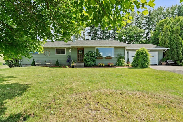 25210 E Bradshaw Rd, Fairfield, WA 99012 - single story home featuring a garage, asphalt driveway, and a front lawn