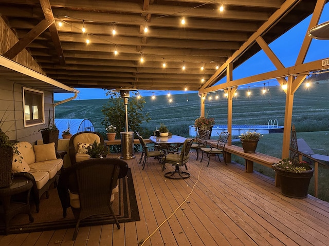 25210 E Bradshaw Rd, Fairfield, WA 99012 - deck at night with outdoor dining space