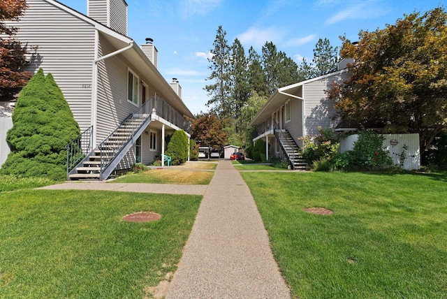8612 N Mayfair Rd Unit 6, Spokane, WA 99208 - view of property's community with stairway and a lawn