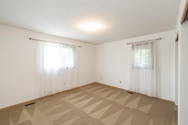 14006 E Cataldo Ave, Spokane Valley, WA 99216 - unfurnished room with healthy amount of natural light and light colored carpet