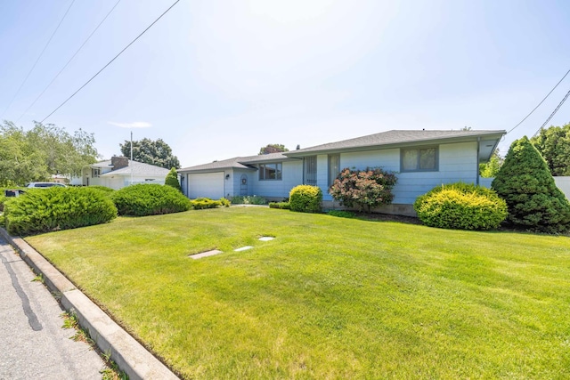 14006 E Cataldo Ave, Spokane Valley, WA 99216 - view of front of property with a garage and a front yard