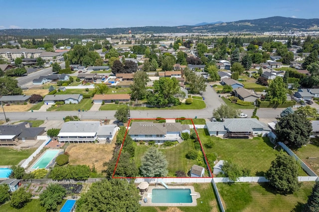 14006 E Cataldo Ave, Spokane Valley, WA 99216 - aerial perspective of suburban area featuring property boundaries highlighted and a mountain backdrop