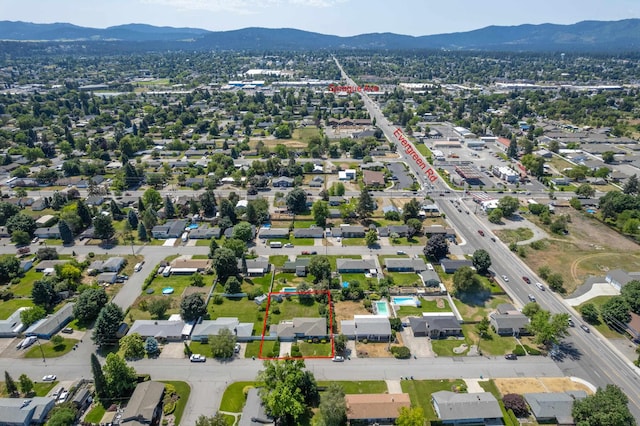 14006 E Cataldo Ave, Spokane Valley, WA 99216 - aerial view of property's location with property boundaries highlighted and a mountainous background